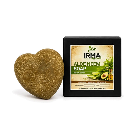 Heart-shaped aloe neem soap next to its black retail packaging box by IRMA Herbs, on a clean white background.