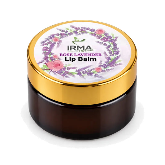 A dark amber glass jar of IRMA Naturals Rose Lavender Lip Balm with a shiny gold metallic lid rim and a white label featuring a lavender wreath and pink roses.