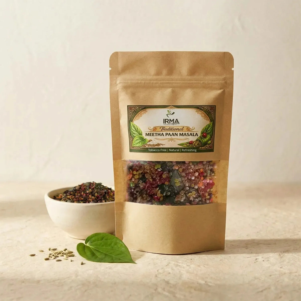 IRMA Traditional Meetha Paan Masala pouch with natural ingredients displayed with fresh betel leaves