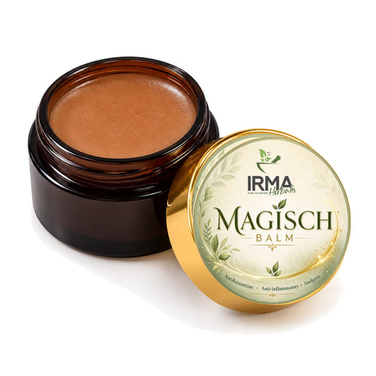 An open amber glass jar containing a brown balm next to its gold and green lid, which features the brand name 'IRMA HERBES' and product name 'Magisch Balm'.